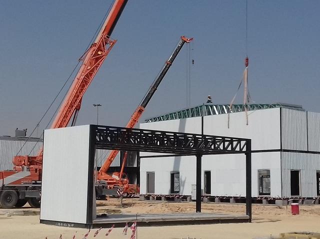 Figure 8: Spacemaker KSA factory manufactured 3D module waiting for the crane to become part of a whole building